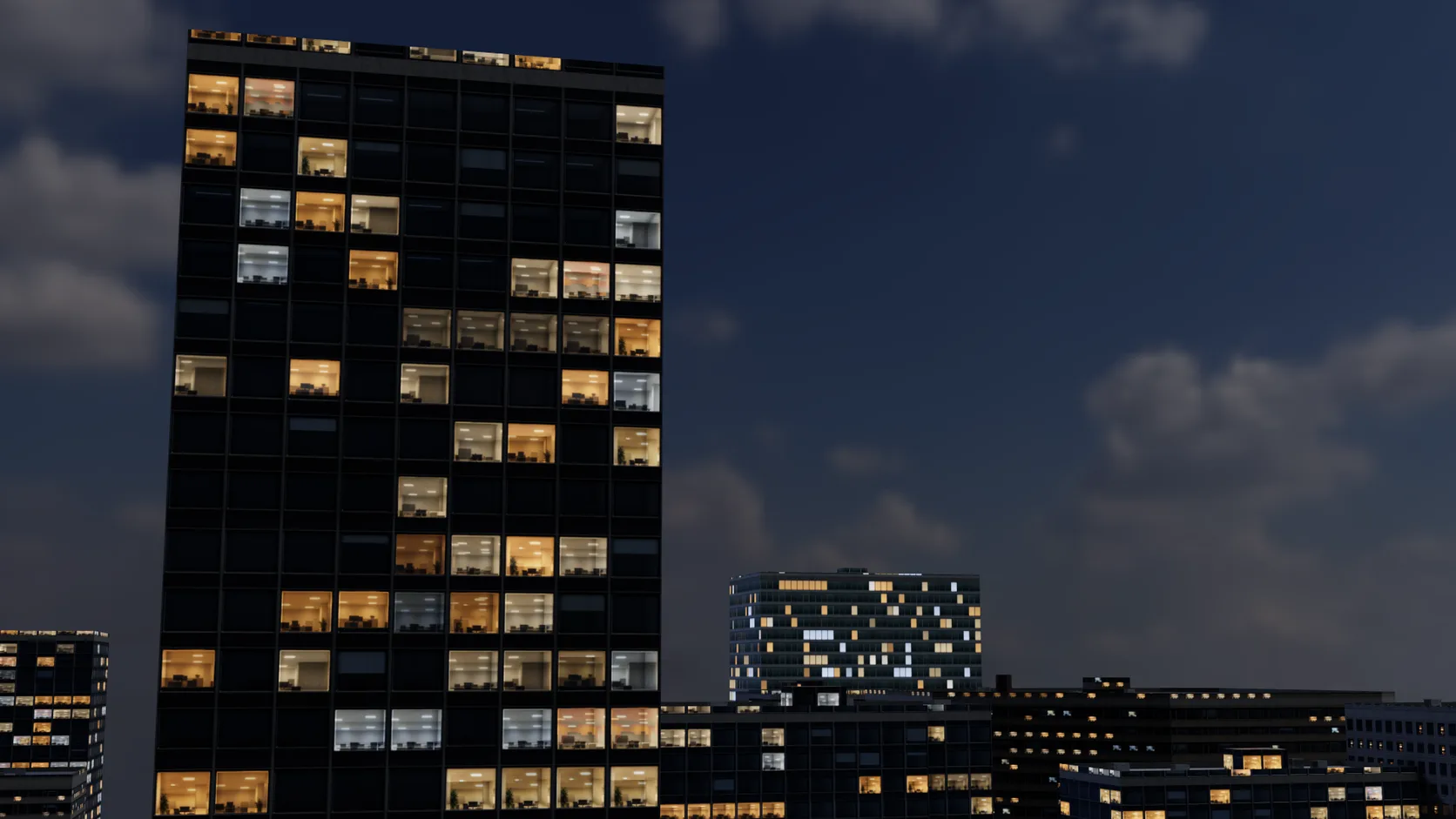 A close view of an office tower at night where each lit window shows a furnished room behind the glass