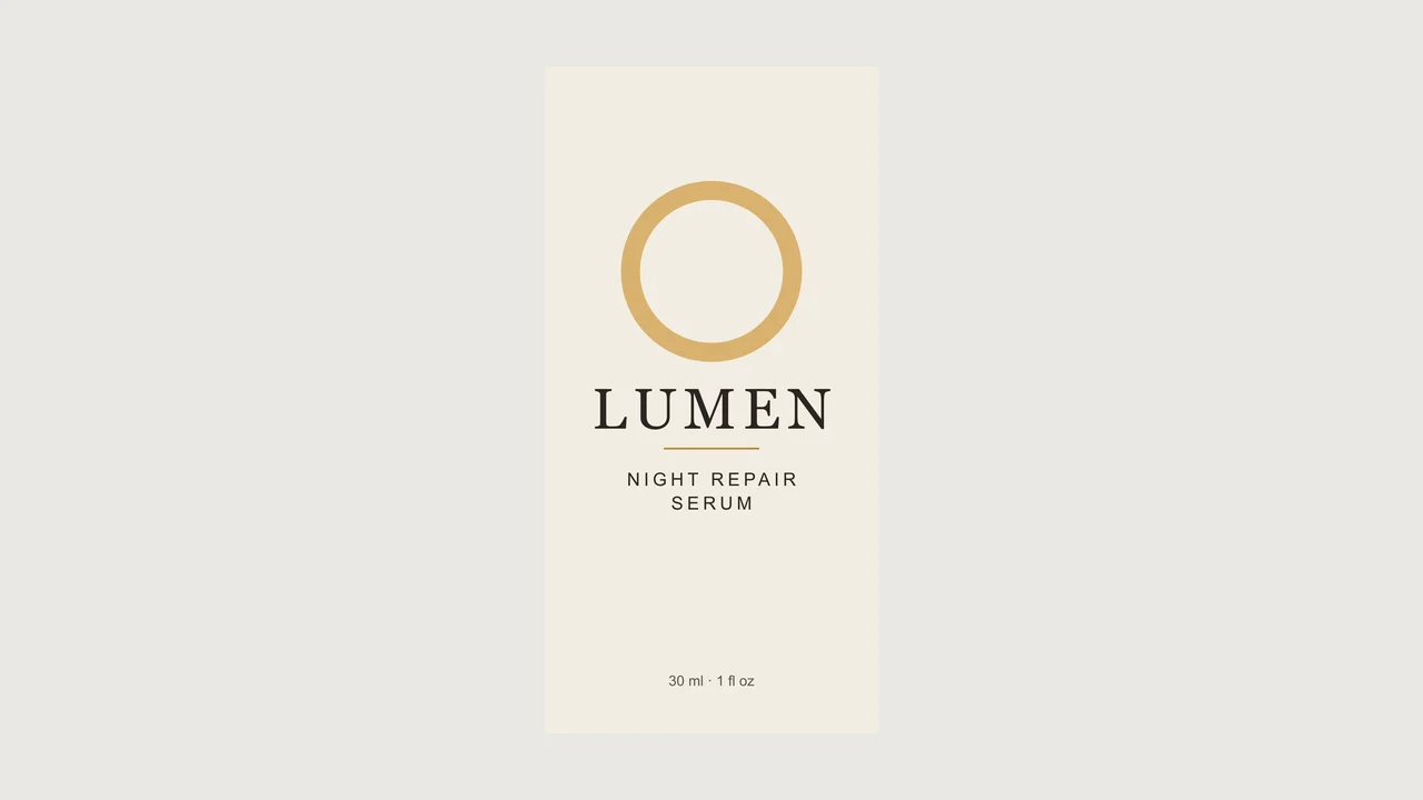 精華液盒的平面正面設計稿:奶油色底上的金色圓環標誌和文字 LUMEN