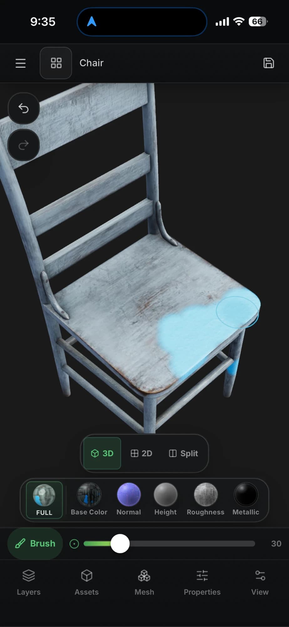 Mixos Paint running in a browser on an iPhone: a weathered pale-blue wooden chair in the 3D viewport with a cyan brush stroke half-painted across the seat, the 3D/2D/Split view switch, the channel strip for base color, normal, height, roughness and metallic, the Brush tool with its size slider, and the Layers, Assets, Mesh, Properties and View tabs along the bottom.